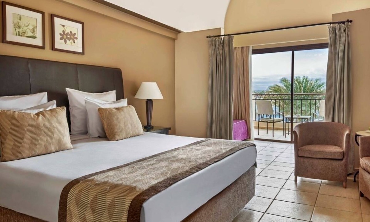 Port Ghalib Hotel | Diving & Dining Delight: Beachfront Pools, Yoga, Spa & Walkable Entertainment