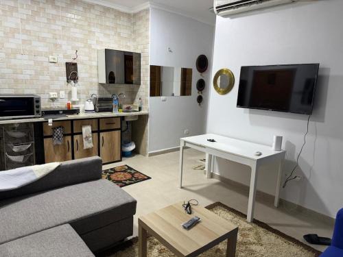 Ad-Dab'ah Apartment | Gaia sabbour ground with garden