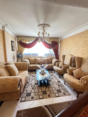 Sidi Jabir Apartment | Regal and Spacious Retreat with Crystal Chandeliers