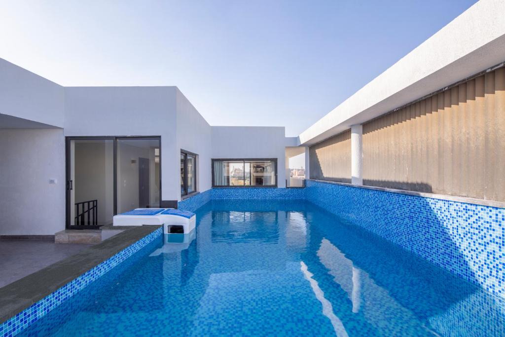 New Cairo Apartment | Sakura - Lake View Residence, 4BDR Pool by Kennah