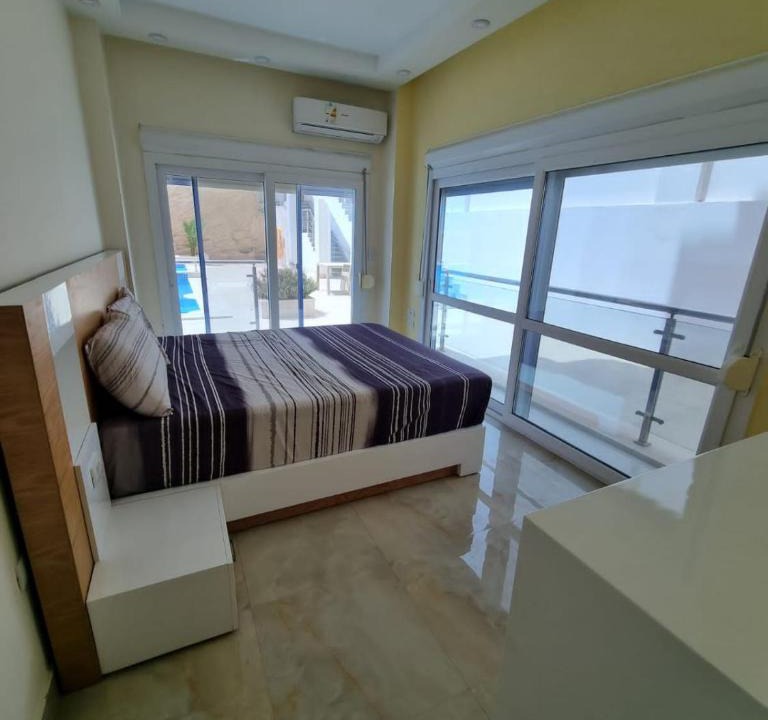 Ras Nasrani Apartment | Spacious 3 BDR with Private Backyard and Free Pool Access & Wild Beach Access