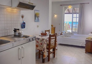 Apartment for 2 people with a beautiful sea view just 50m from the beautiful sandy beach in Agios Georgios Pagi