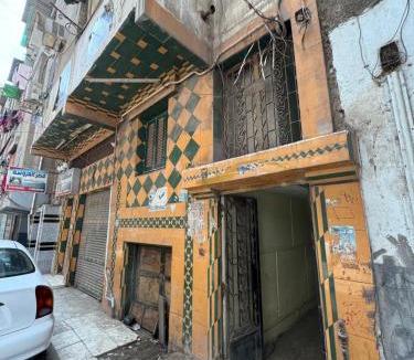 Mansoura Apartment | غرفه خاصه لك جديده وفرش جديد ومميز بها سريرين وتلفزيون