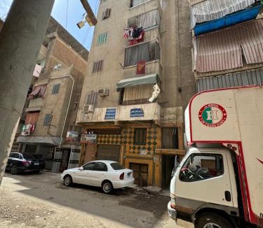 Mansoura Apartment | غرفه خاصه لك جديده وفرش جديد ومميز بها سريرين وتلفزيون
