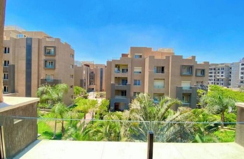 The 5th Settlement Apartment | Chic 2BR Apartment with Private Garden | Prime Location by AUC