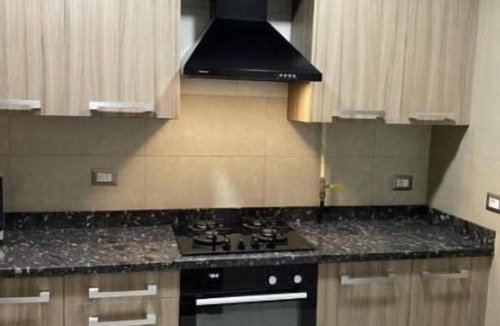 Oula Apartment | Cozy 2-bedroom apartment in el karma compound-sheikh zayed with AC, WiFi