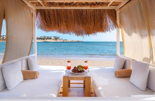 Port Ghalib Hotel | Diving & Dining Delight: Beachfront Pools, Yoga, Spa & Walkable Entertainment