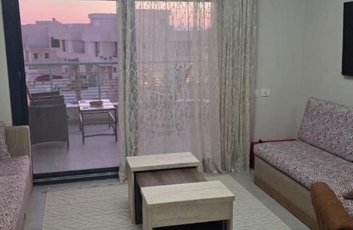 Ad-Dab'ah Apartment | Elegant Stay Pool & Sea View at June Ras El Hekma