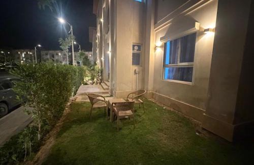 Ad-Dab'ah Apartment | Gaia sabbour ground with garden