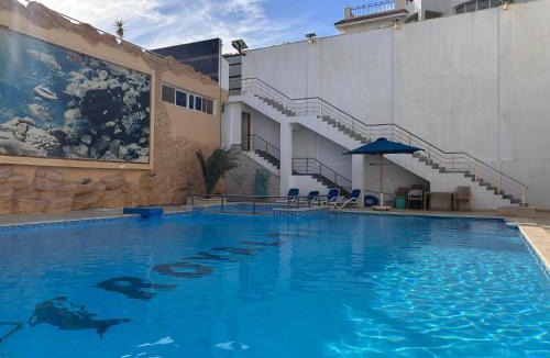 Ras Nasrani Apartment | Lovely 3 BDR with Sea View and Private Rooftop Area, Free Pool & Wild Beach Access