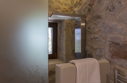 Arachova Apartment | Milia Room. Spacious and autonomous, ideal for a couple.