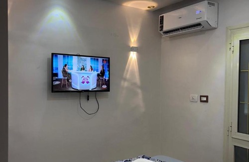 Al-Jumruk Apartment | Modern downtown apt by Qaitbay Citadel Air condition with free WiFi and Balcony with side sea view