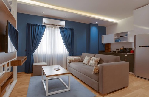 New Cairo Apartment | Modern Studio Near Cairo Airport & Festival City with Garden View