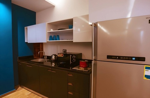 New Cairo Apartment | Modern Studio Near Cairo Airport & Festival City with Garden View