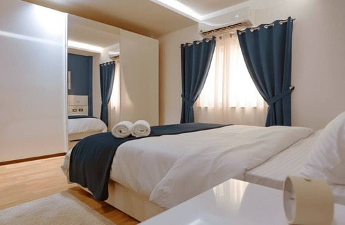 New Cairo Apartment | Modern Studio Near Cairo Airport & Festival City with Garden View