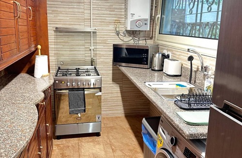 Heliopolis Apartment | Premium 1BR Heliopolis Suite | Private Garden Terrace & A/C