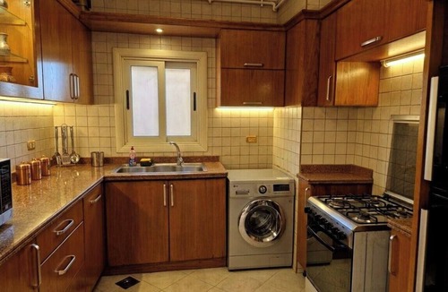 Al Duqqi Apartment | Royal Retreat in Dokki Spacious with Nile View
