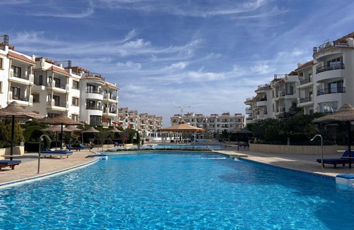 Ras Nasrani Apartment | Sharm Hills - 2BR with Pool View and Free Beach Access