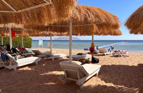 Ras Nasrani Apartment | Sharm Hills - 3BR with Pool & Aquapark View and Free Beach Access