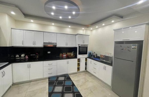 Ras Nasrani Apartment | Spacious 3 BDR with Private Backyard and Free Pool Access & Wild Beach Access