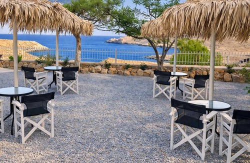 Omales Condo | Tainaros Rooms - Beachfront Comfy Getaway