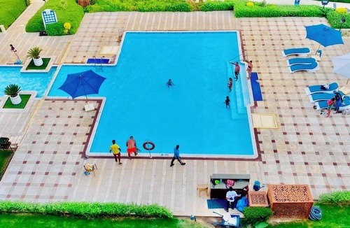 Al Mamsha El Seyahi Apartment | Top Floor Studio with Sea & Pool View Gravity Resort