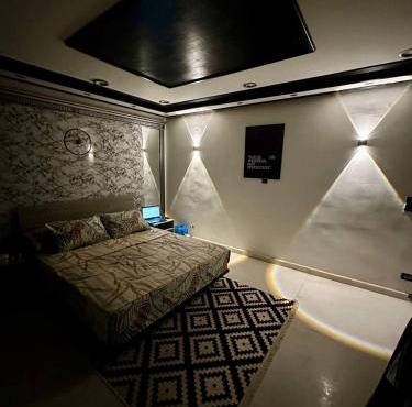 A private room exclusively for men, offering comfort and convenience for a relaxing stay in Cairo
