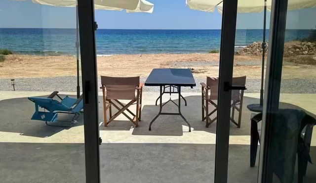Brand new beachfront house in Koutsouras — 30 steps to crystal-clear water! in Makry Gialos