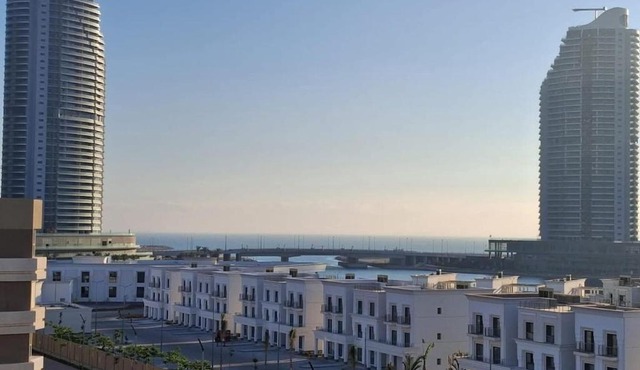 Chic Apt in Palm Hills Pool & Sea View شقة فاخرة بفيو بحر وحمام سباحة