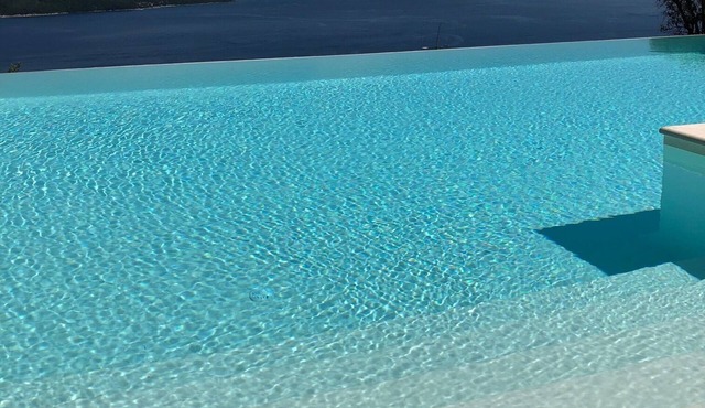 Contemporary villa, prime location , stunning views and heated infinity pool in Corfu