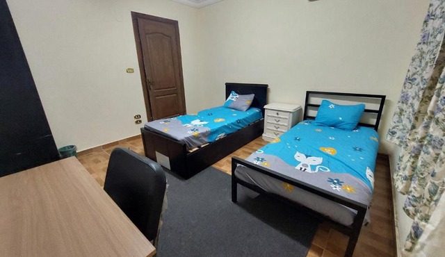 Cozy Private Room in Waha City - 15 Mins to Cairo Airport in Cairo