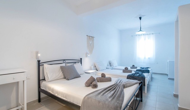 Economy Quadruple Room Apartment with Balcony, Wi-Fi and Air Conditioning in Perissa