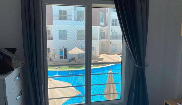 Ground floor poolside duplex