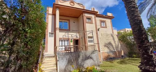 Lovely 5Bedroom Villa -Compound - Swimming Pool at Green Oasis Resort in ‘Izbat as Sarāḩnah