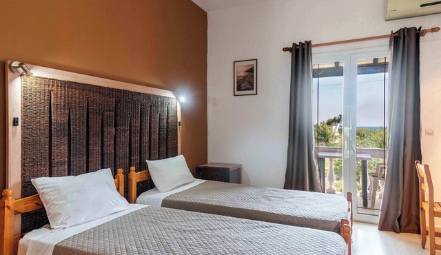 Pink House Socrates Corfu Beachside Apartments in Gardenos