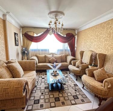 Regal and Spacious Retreat with Crystal Chandeliers in Alexandria