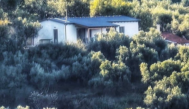 Self-sufficient straw bale house in organic olive grove, with sea view in Kato Samiko