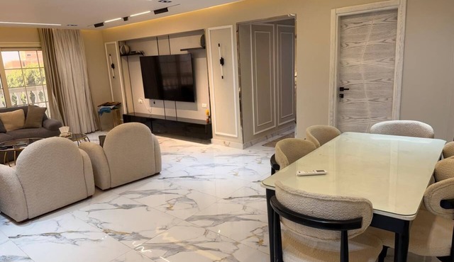 Spacious 3-bedroom apartment in tranquil Giza Governorate with AC