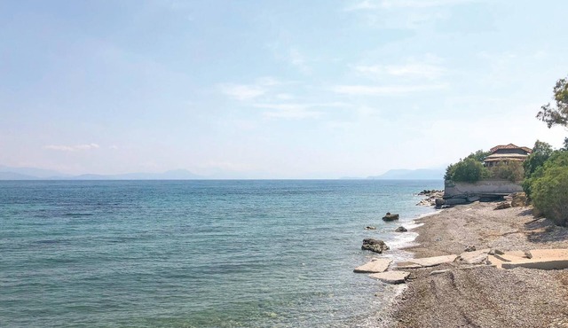 This beautiful apartment is located only 30 m from the beach in the coastal village of Melissi. in Corinth