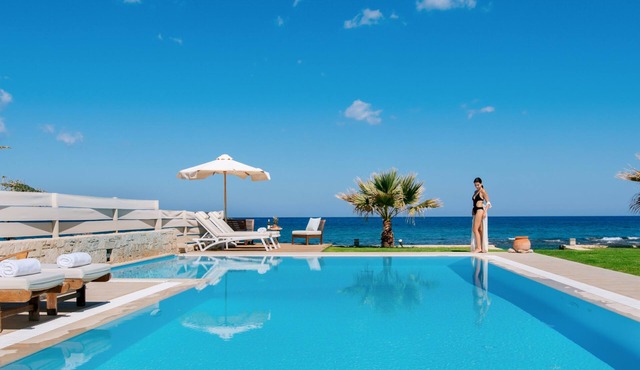 Unique beachfront location, heated pool with built-in hydromassage, large garden in Heraklion