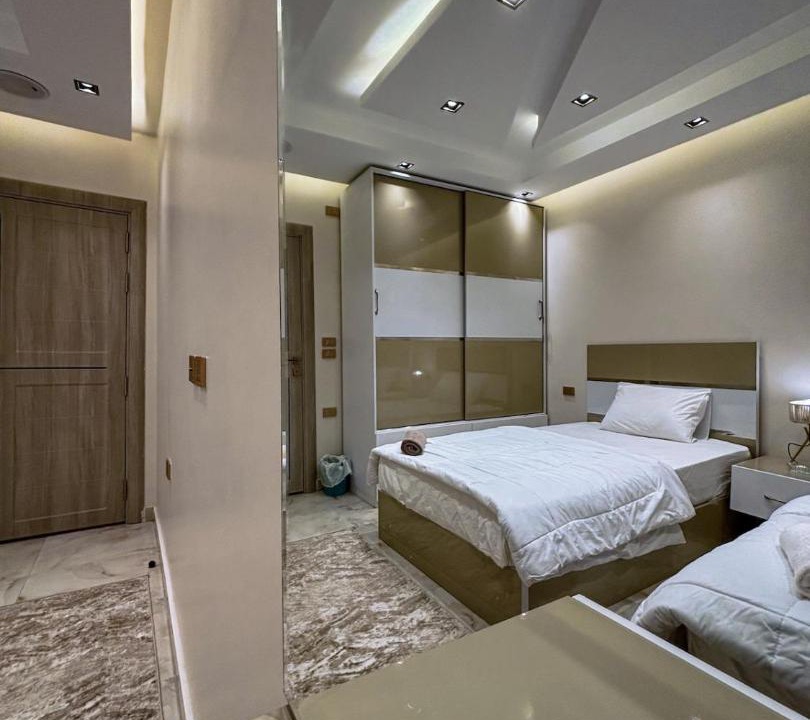 Al Duqqi Apartment | Cozy Twin Room Central Mohandessin near El-Dowal