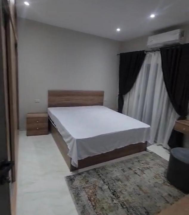 Al Mamsha El Seyahi Apartment | marvel white apartment