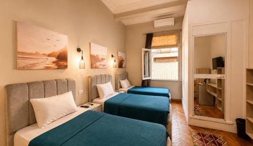 Deluxe Triple Room