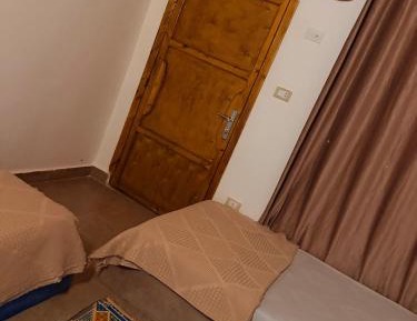 Triple Room with Shared Bathroom