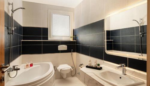 Three-Bedroom Premium Apartment with Balcony