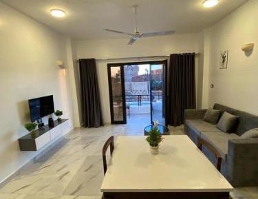 One-Bedroom Apartment with Balcony and Water View