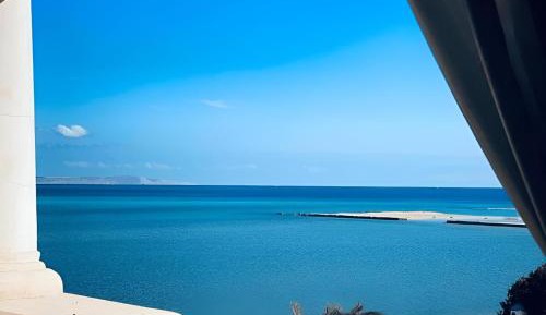 One-Bedroom Apartment with Balcony and Sea View