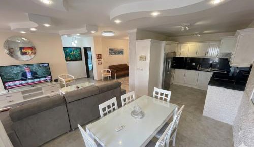 Three-Bedroom Apartment with Sea View