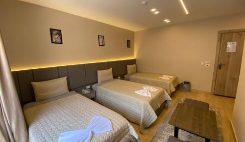 Deluxe Triple Room with Balcony