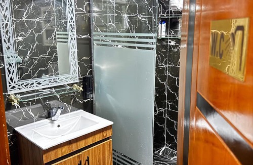 Al Haram Apartment | The "Villa of Dreams VIP" is reserved exclusively for families. The renter is required to provide a security deposit, which will be refunded upon checkout.